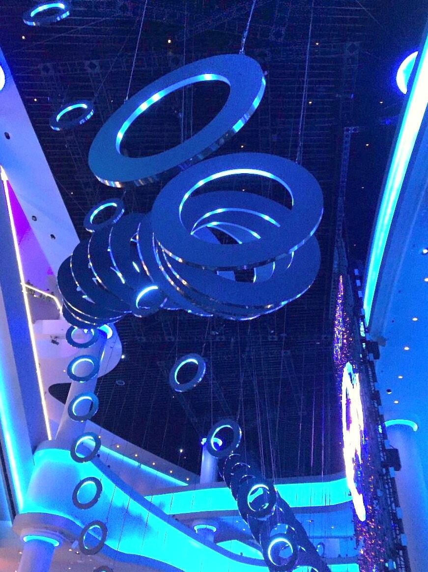 Hanging circular objects in UV-lit foyer of the Sphere, Las Vegas