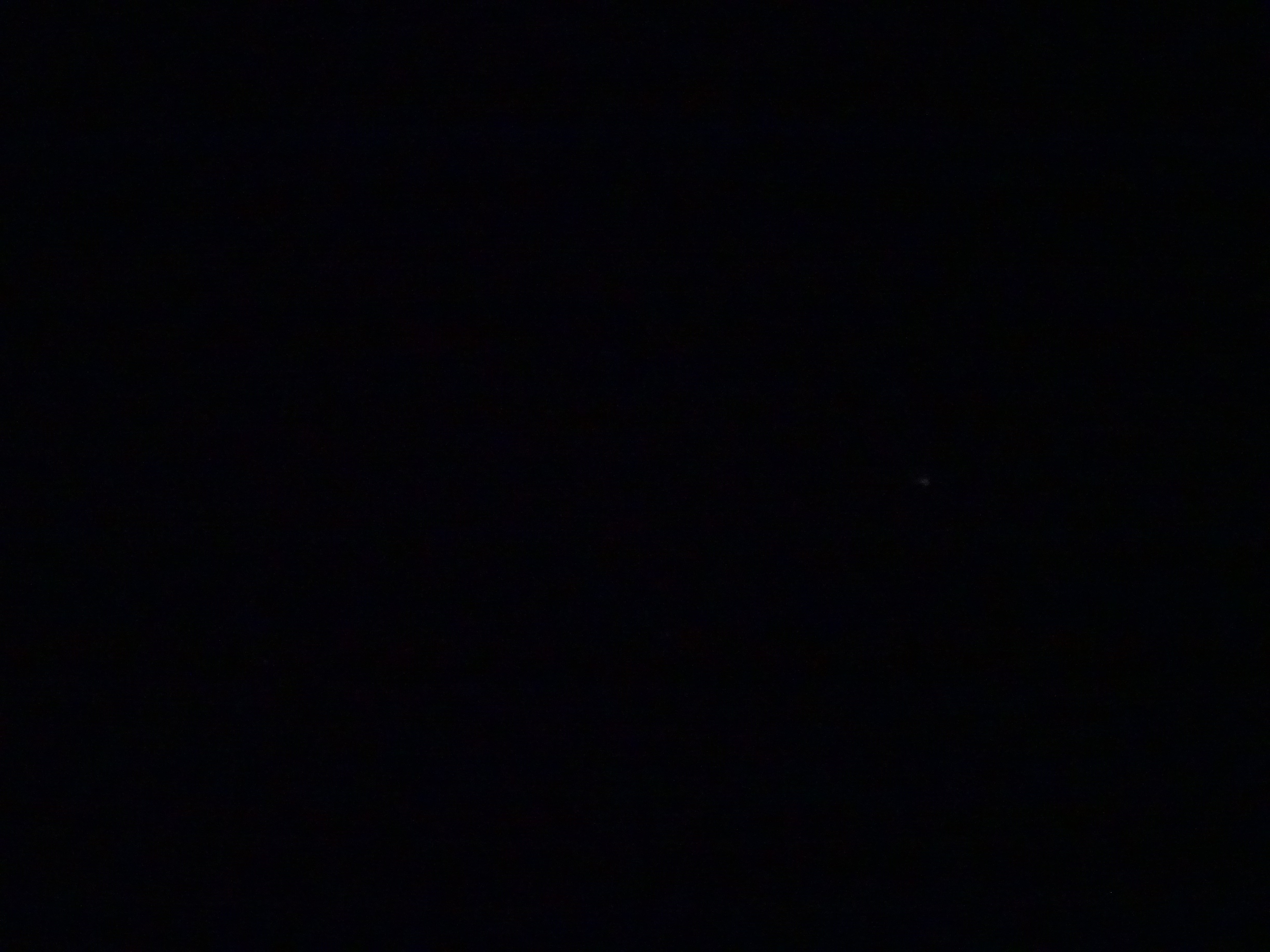 Pitch black view of night sky