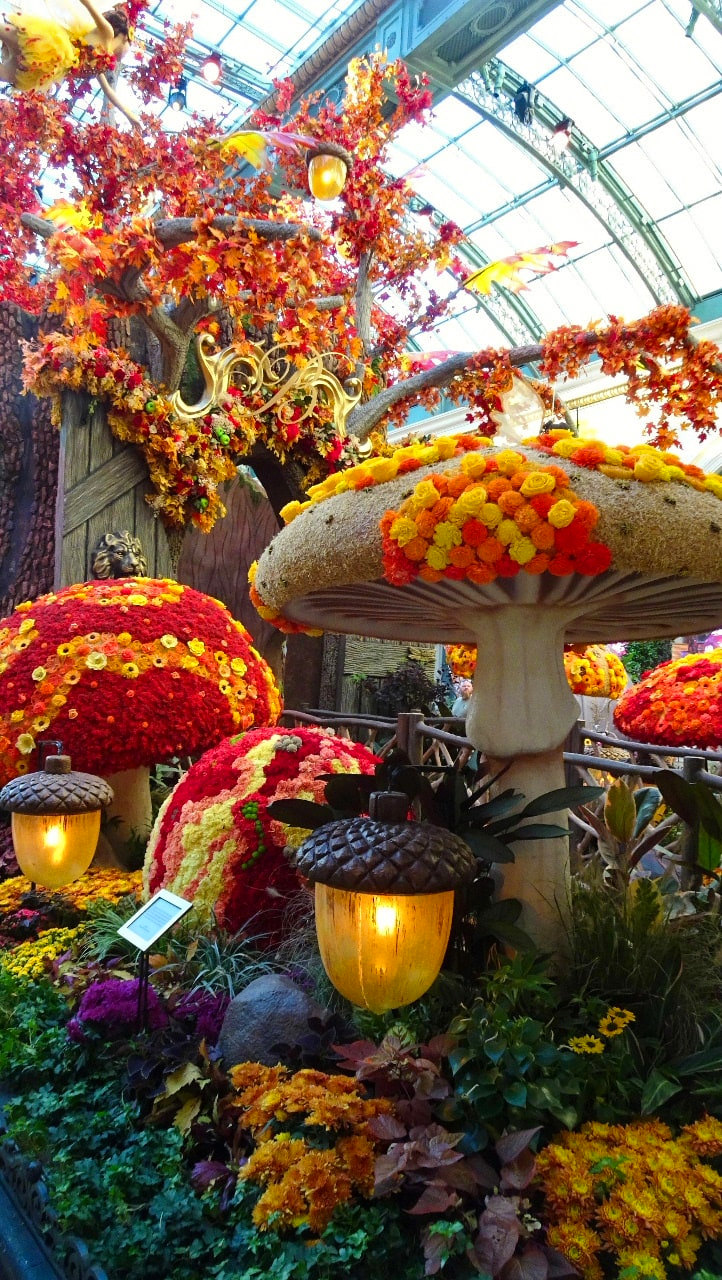Magical fairy garden with giant toadstools and flowers in foyer of The Bellagio, Las Vegas