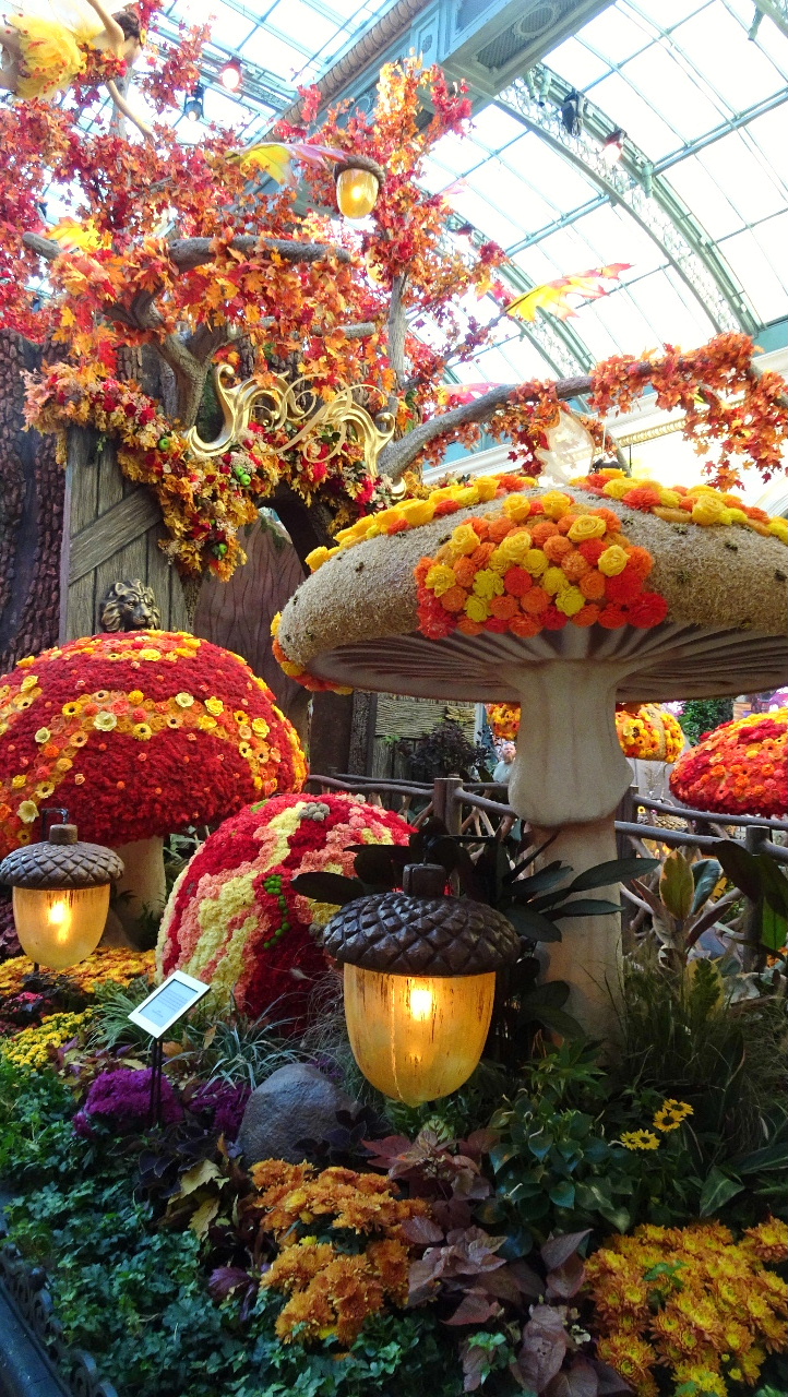 Magical fairy garden with giant toadstools and flowers in foyer of The Bellagio, Las Vegas