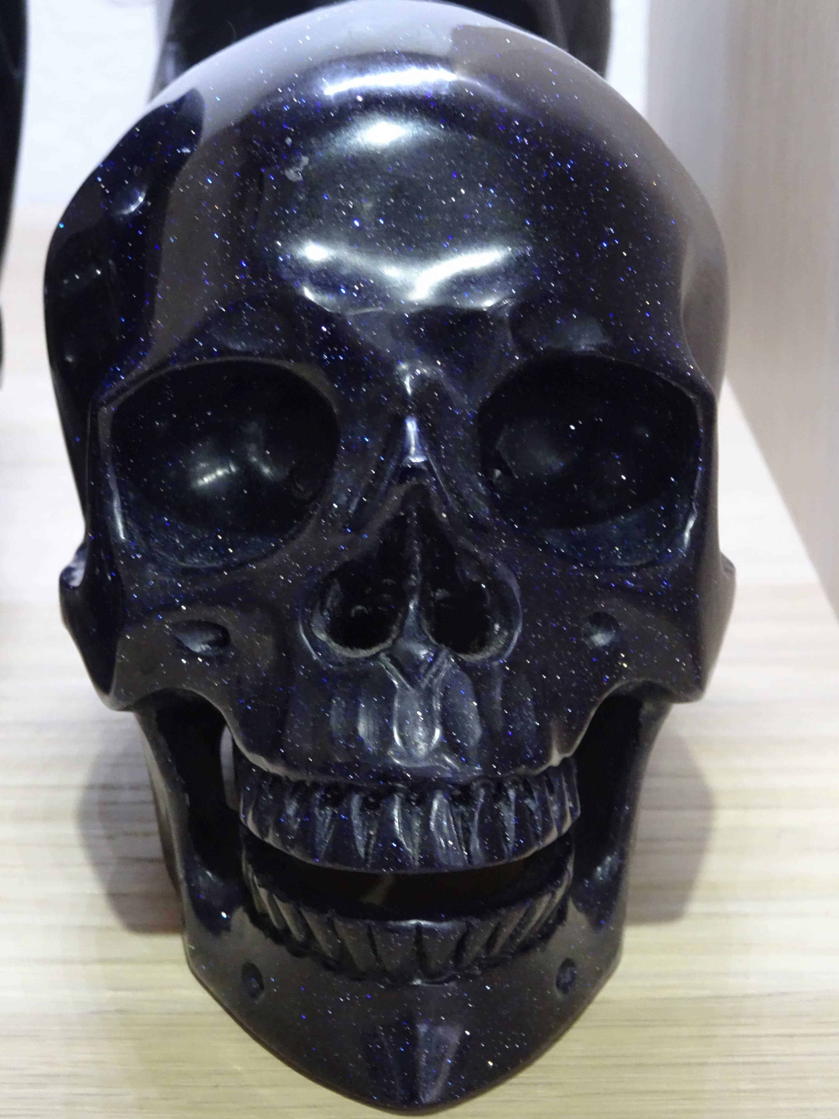 Purple goldstone carved crystal skull