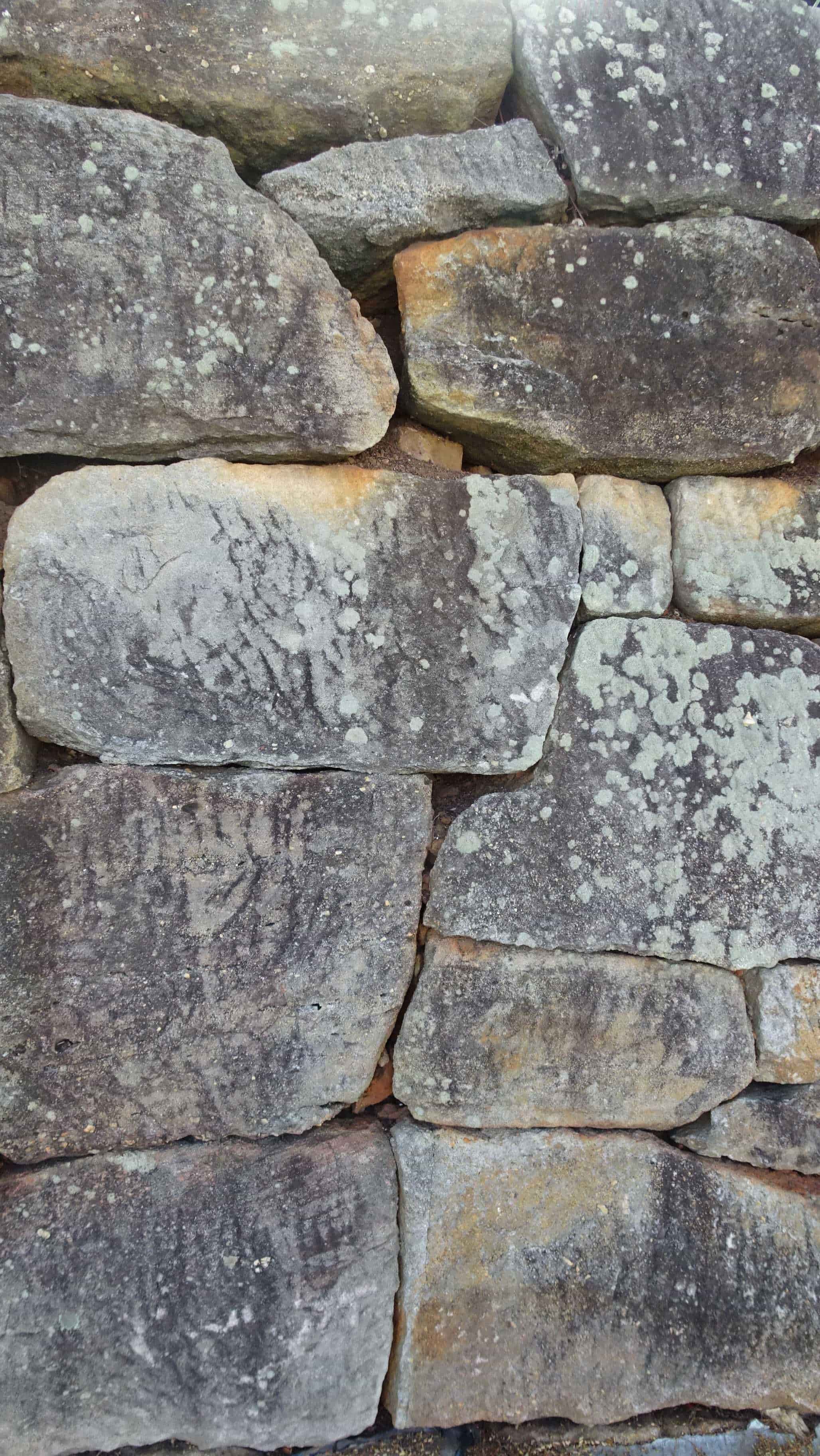 Close up of grey stones in rock wall