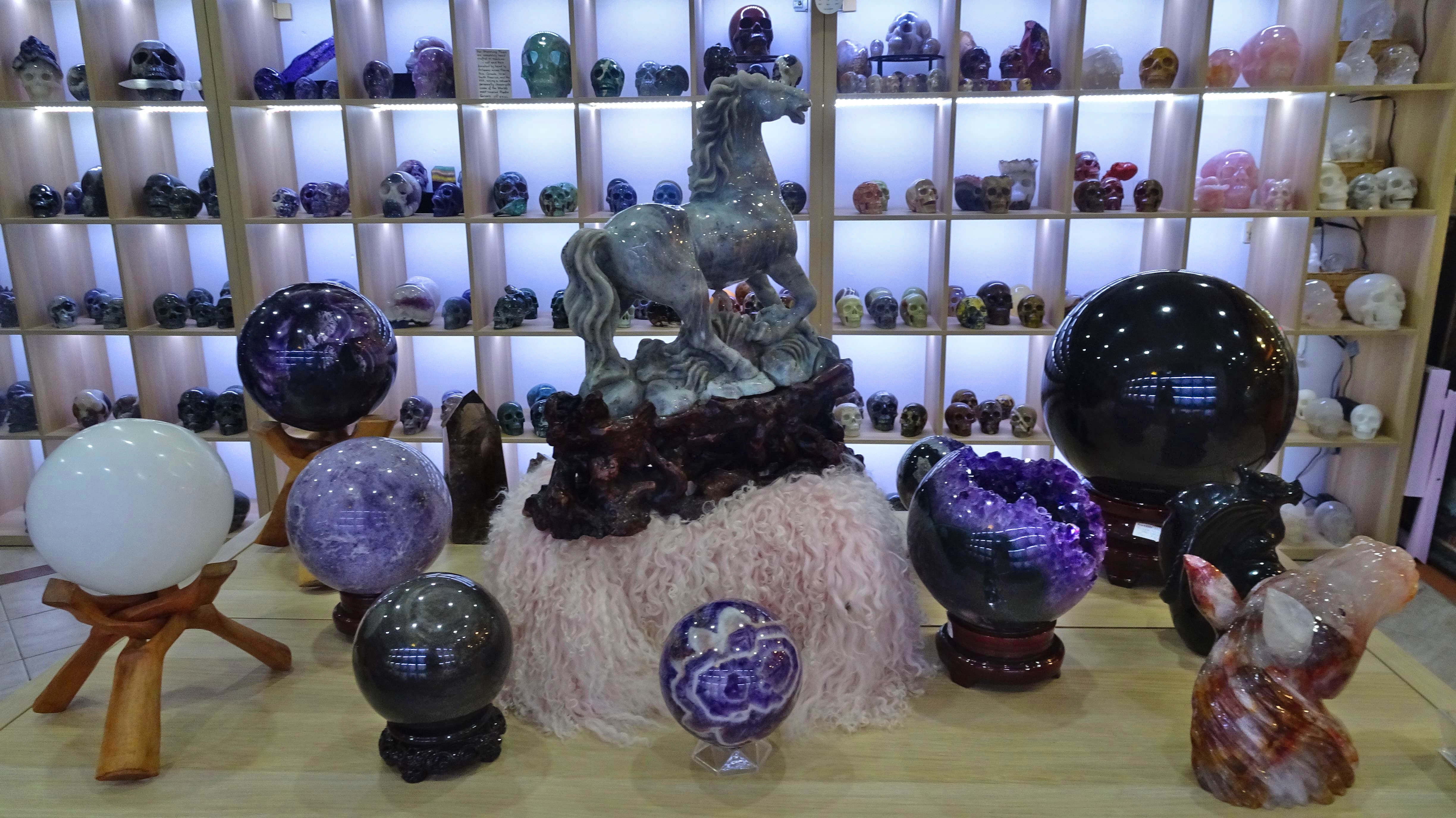 Central display & shelving in crystal skull store