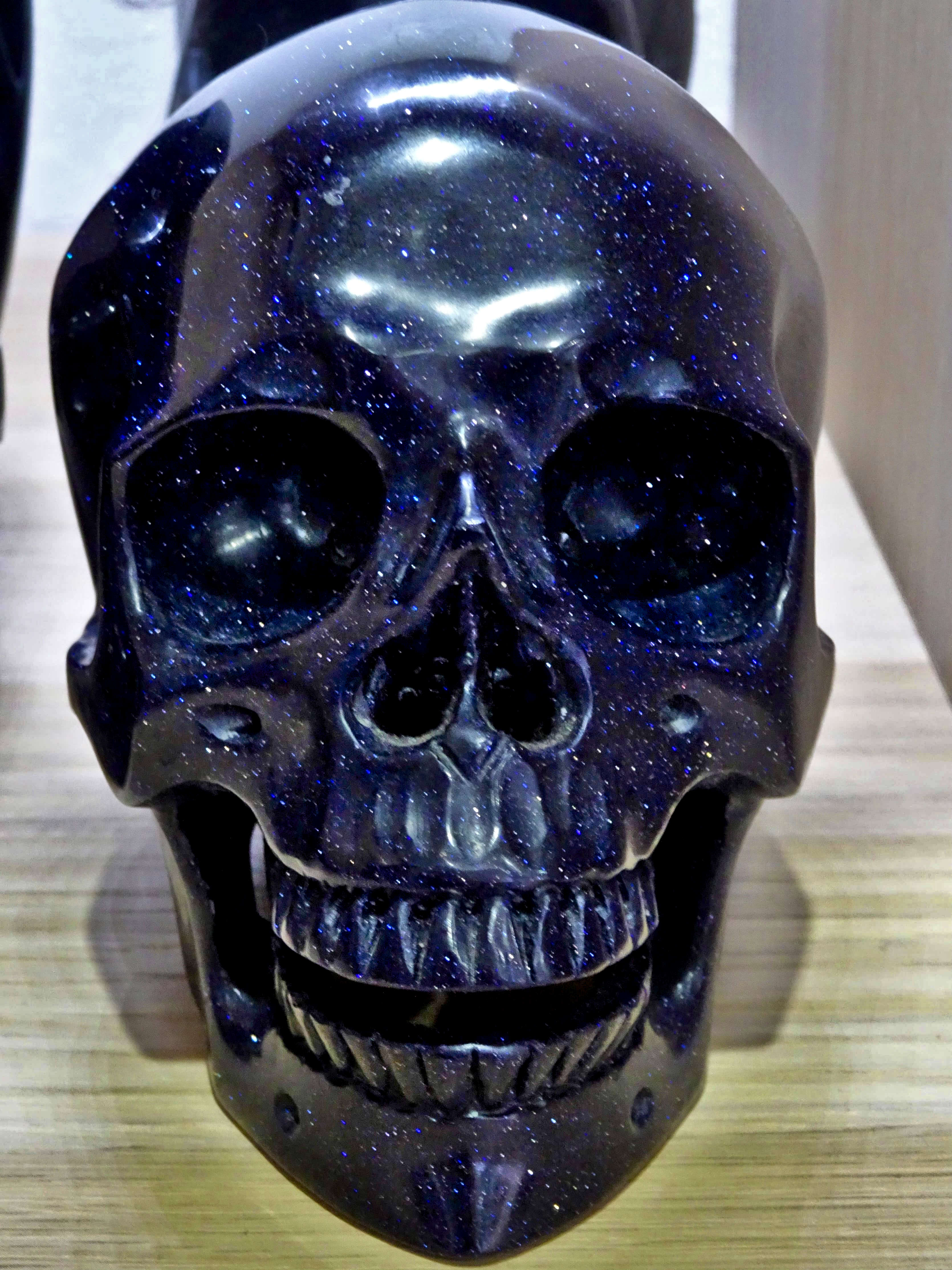 Purple goldstone carved crystal skull