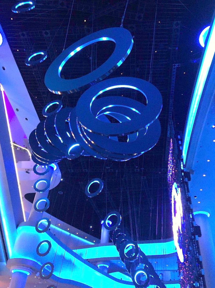 Hanging circular objects in UV-lit foyer of the Sphere, Las Vegas