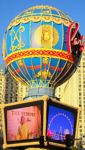 Hot air balloon & Paris signage with digital display outside Paris-Las Vegas  HotelSignage on footpath for Crystal Skull Shop